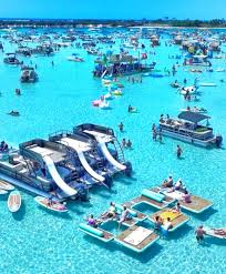 Crab Island boats and floats on turquoise water